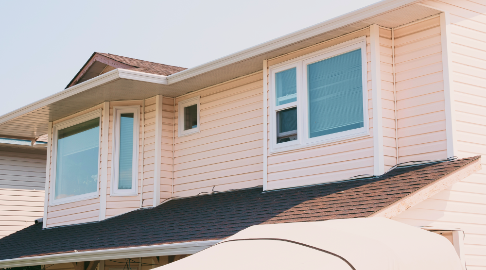 New windows installed on a two-story BC home by HTR Windows & Doors